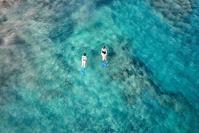 Guided Snorkeling Experience - Gear up with the included equipment and multilingual instruction