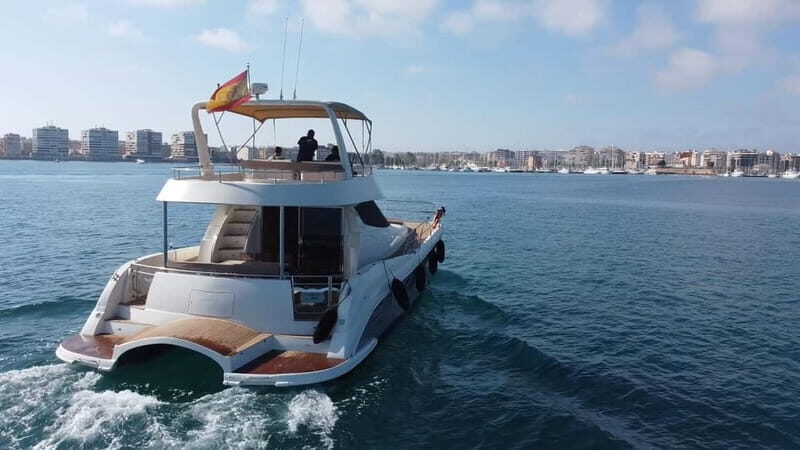 Puerto del Carmen: Private Sunset Catamaran Tour with Drinks - Cruising past Puerto Calero, Playa Quemada, and Punta Gorda