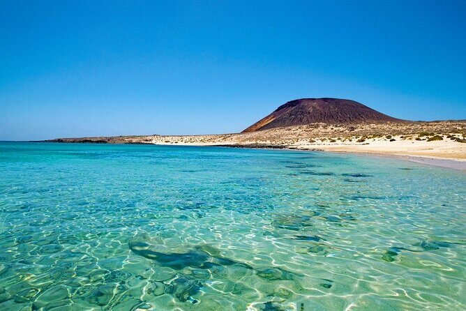 Traditional Canarian street market and marine reserve of La Graciosa - The Ferry Moment: A Quick 25 Minutes to Change the Scene